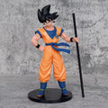 Action figure Dragon Ball di Goku alta 22 cm con articolazioni multiple e bastone Nyoi intercambiabile, dettagli accurati su viso e abbigliamento fedeli all'anime