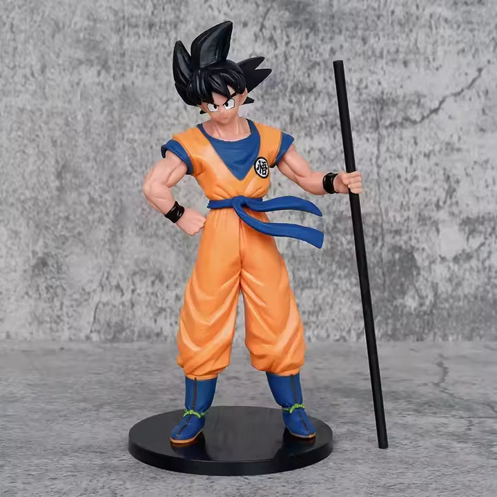 Action figure Dragon Ball di Goku alta 22 cm con articolazioni multiple e bastone Nyoi intercambiabile, dettagli accurati su viso e abbigliamento fedeli all'anime